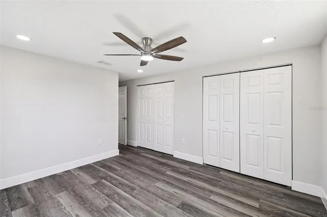 a house with trees in the background