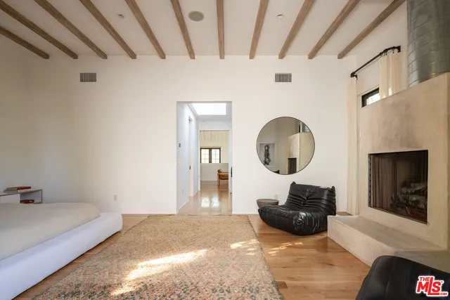 a spacious bathroom with a tub and shower