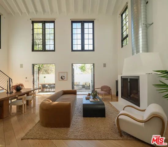 a living room with furniture or fireplace and a large window