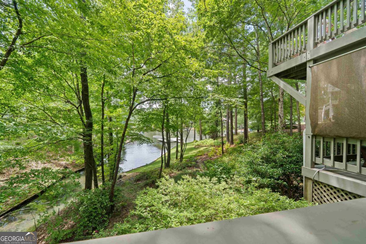 1031 Old Still Road Greensboro, GA 30642 - Photo 67 of 73 a backyard of a house with lots of green space