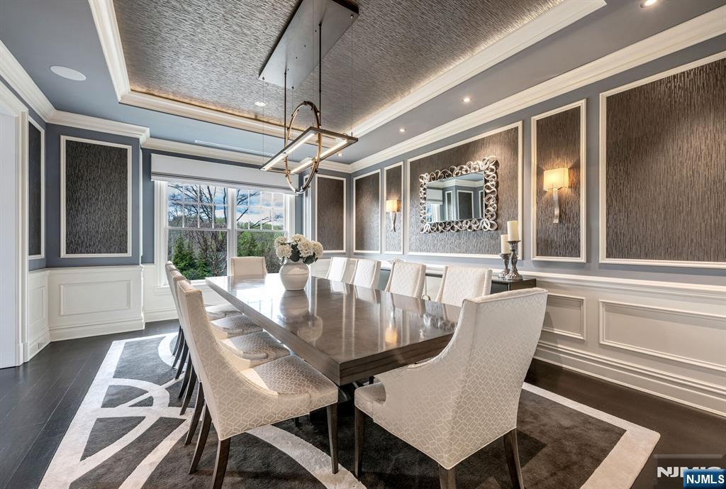 236 East Saddle River Road Saddle River, NJ 07458 - Photo 19 of 50 a view of a dining room with furniture wooden floor and chandelier