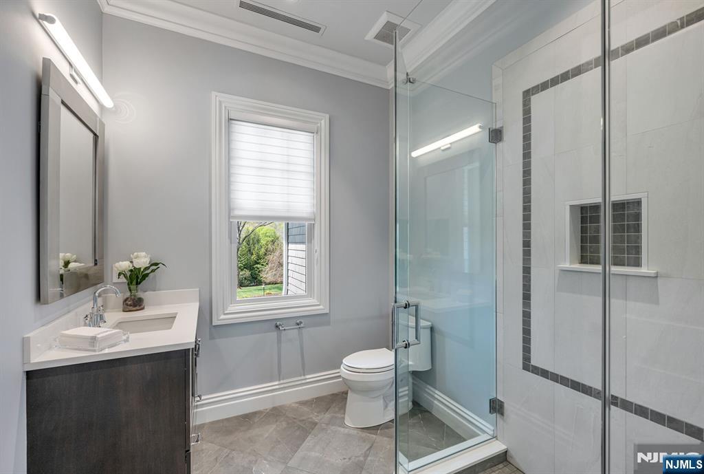 236 East Saddle River Road Saddle River, NJ 07458 - Photo 23 of 50 a bathroom with a sink toilet and shower