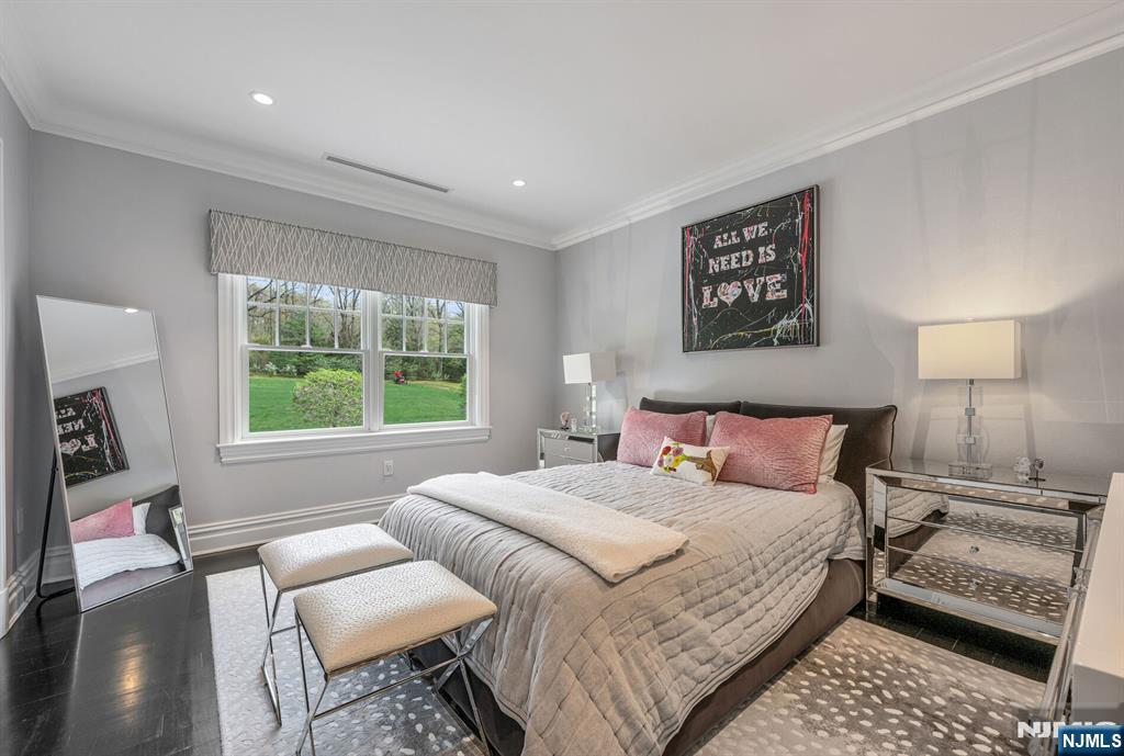 236 East Saddle River Road Saddle River, NJ 07458 - Photo 34 of 50 a bedroom with a bed and a window