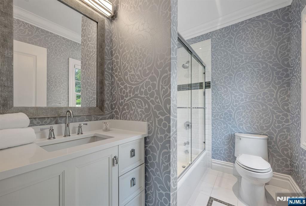 236 East Saddle River Road Saddle River, NJ 07458 - Photo 35 of 50 a bathroom with a toilet sink and mirror