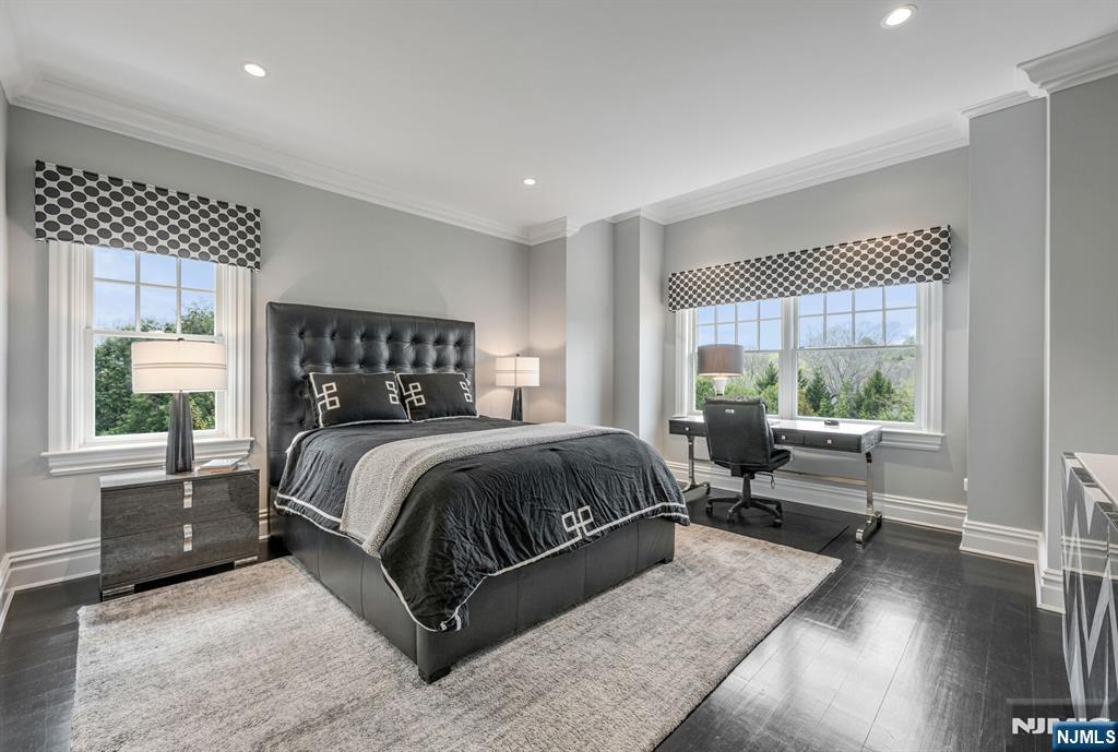 236 East Saddle River Road Saddle River, NJ 07458 - Photo 36 of 50 a bedroom with a bed and a couch
