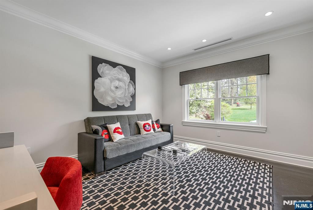 236 East Saddle River Road Saddle River, NJ 07458 - Photo 38 of 50 a living room with furniture and a window