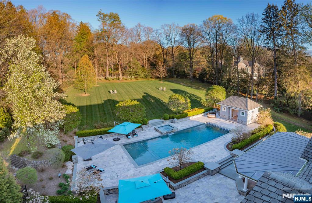 236 East Saddle River Road Saddle River, NJ 07458 - Photo 4 of 50 an aerial view of a houses with a yard