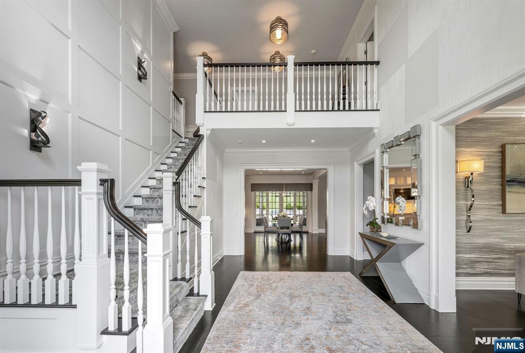 236 East Saddle River Road Saddle River, NJ 07458 - Photo 7 of 50 a view of entryway and hall with wooden floor