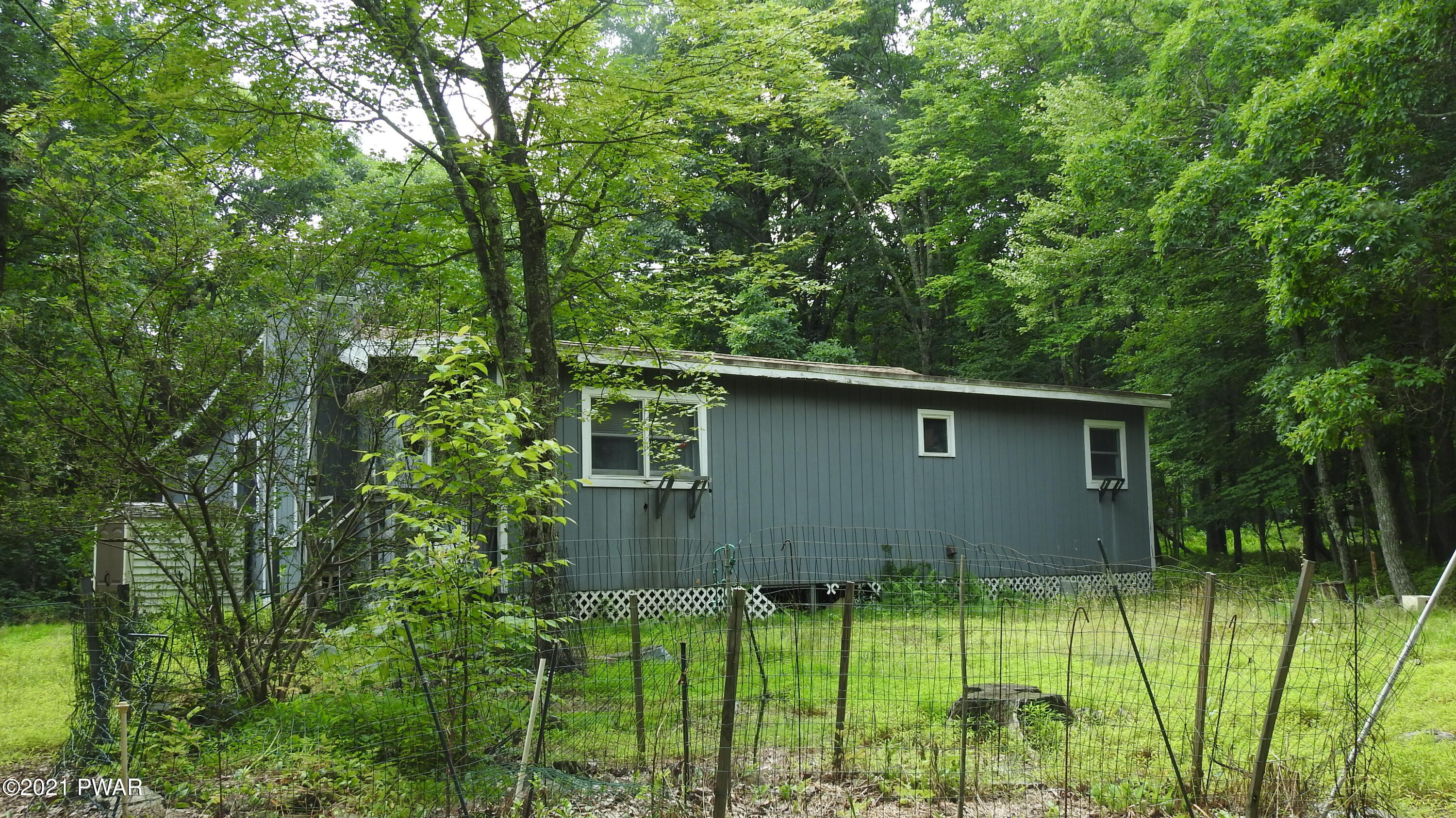 114 Caribou Road Dingmans Ferry, PA 18328 - Photo 5 of 6 Front facing street