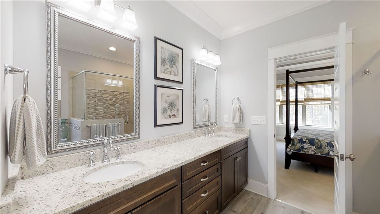 3128 Constance Circle Raleigh, NC 27603 - Photo 16 of 25 Well-lit 5-piece master bath, granite counters, vanity mirrors.