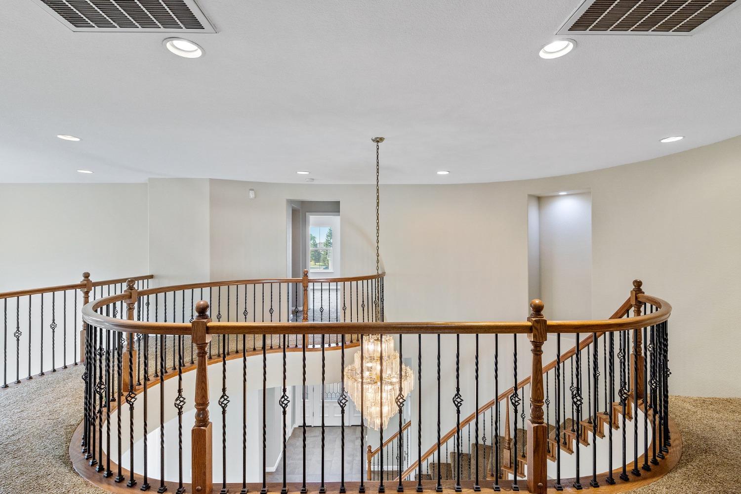 2090 Wisteria Place Manteca, CA 95337 - Photo 43 of 78 a view of staircase with railing and a rug