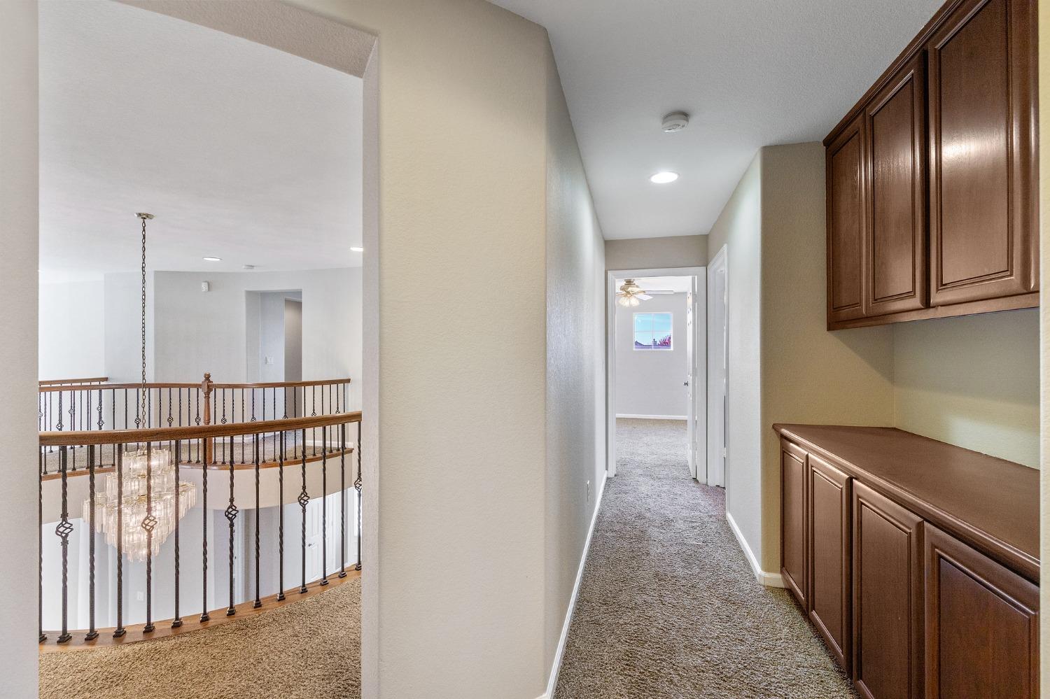 2090 Wisteria Place Manteca, CA 95337 - Photo 51 of 78 a view of hallway with wooden floor