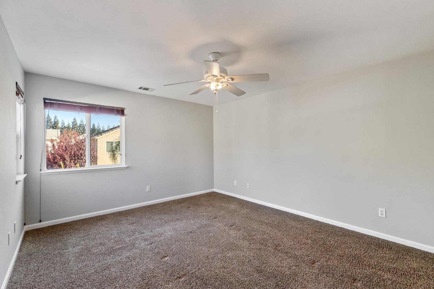 2090 Wisteria Place Manteca, CA 95337 - Photo 53 of 78 a view of an empty room with a window