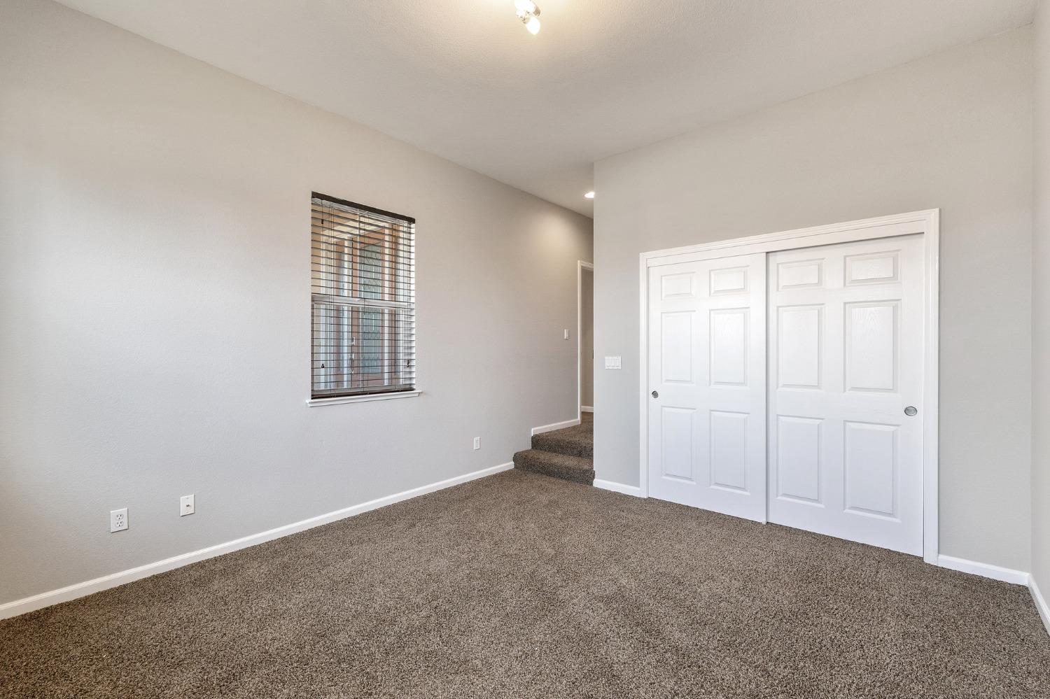 2090 Wisteria Place Manteca, CA 95337 - Photo 63 of 78 an empty room with windows