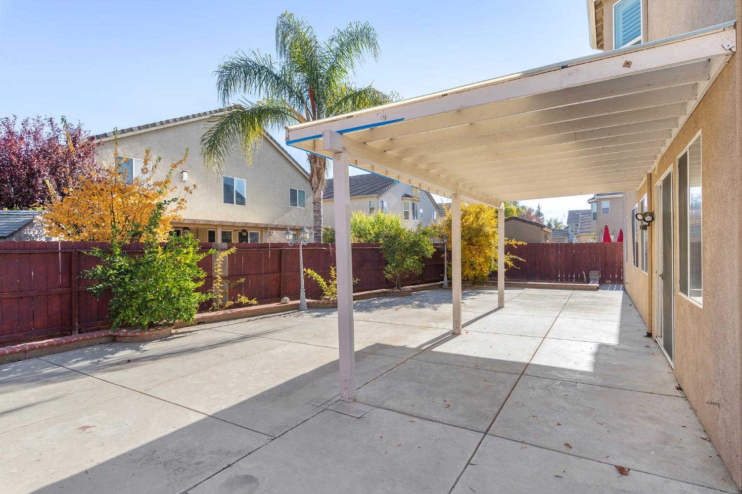 2090 Wisteria Place Manteca, CA 95337 - Photo 71 of 78 a view of a house with a patio