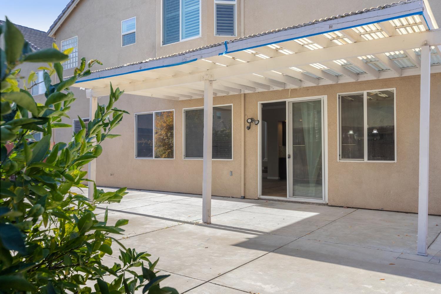 2090 Wisteria Place Manteca, CA 95337 - Photo 73 of 78 a view of a house with a potted plant