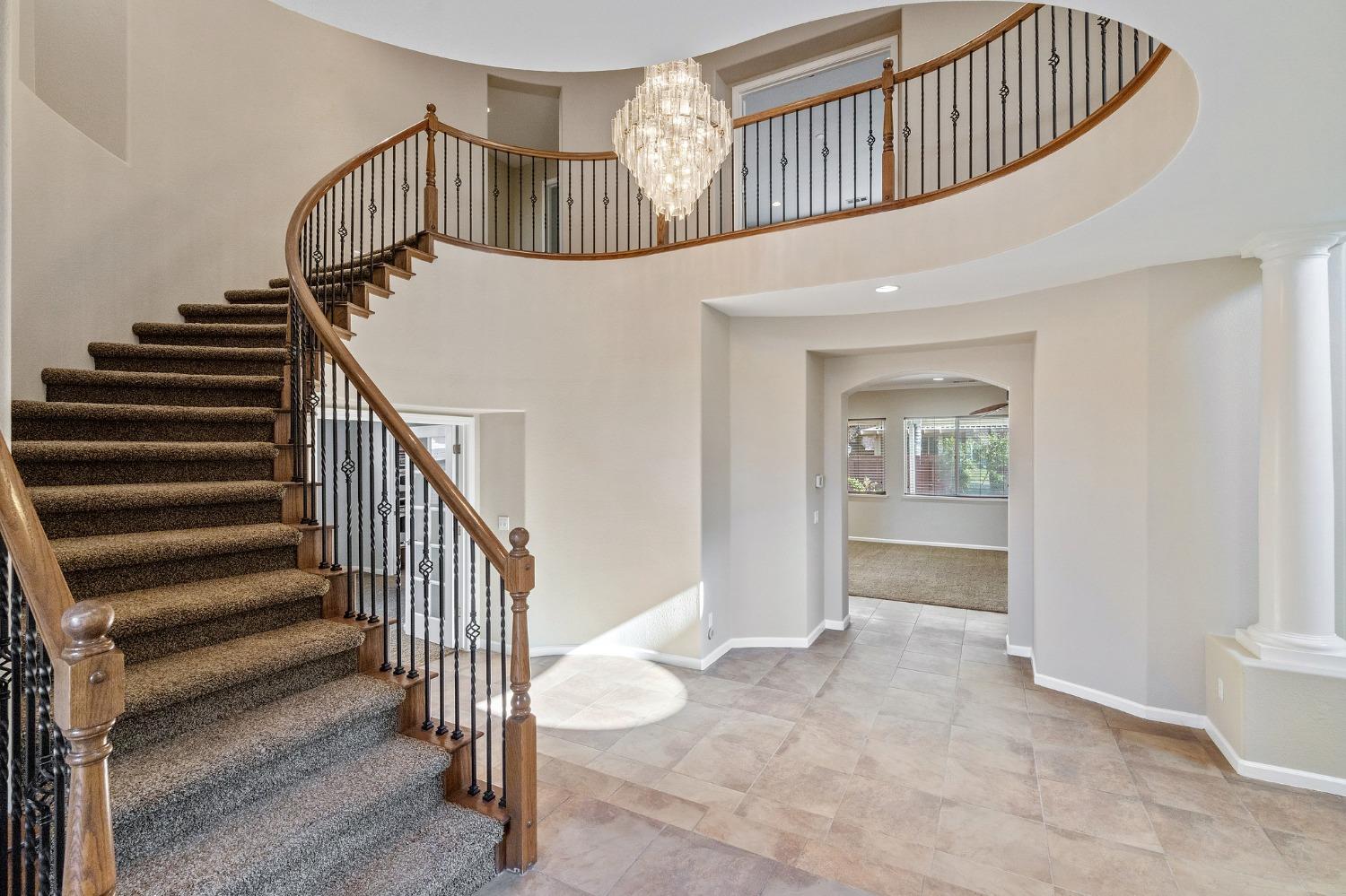 2090 Wisteria Place Manteca, CA 95337 - Photo 8 of 78 a view of an entryway with a front door