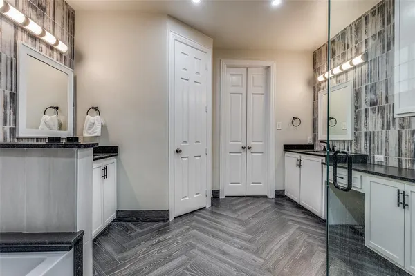 a view of a kitchen with a sink and dishwasher