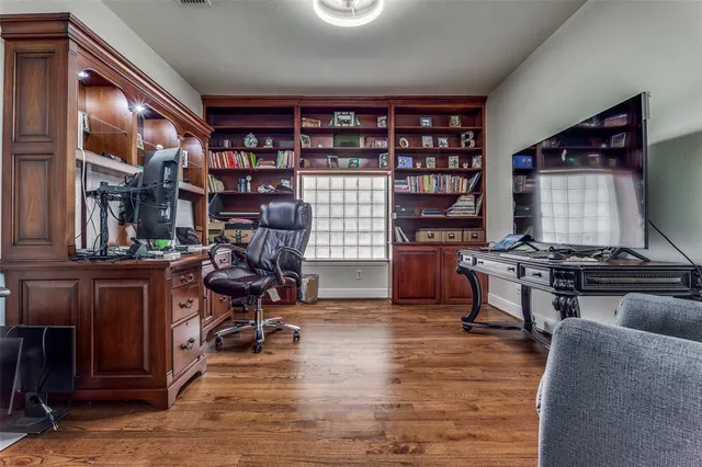 a view of a workspace with furniture