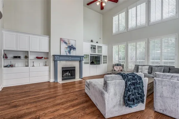 a bed room with furniture and a fireplace