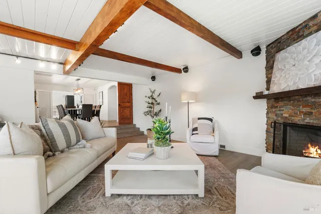 a kitchen with granite countertop a stove top oven and sink