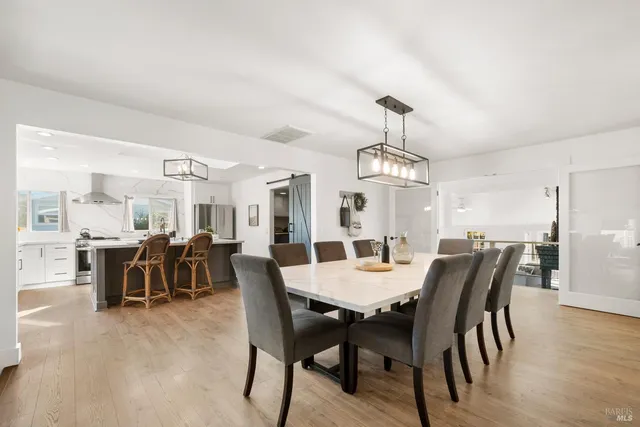 a view of a table and chairs in the patio