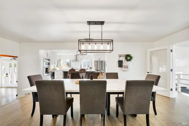 a view of a livingroom with furniture and front door