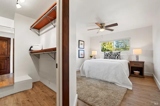 a dining room with furniture and a chandelier