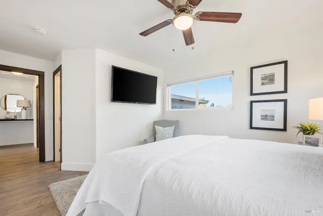 a living room with furniture and white walls