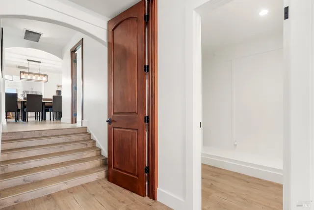 a view of a livingroom with furniture and front door