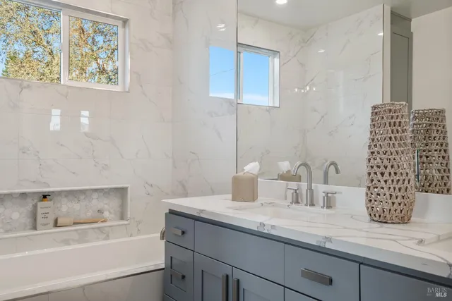 a view of a porch with furniture and next to a window