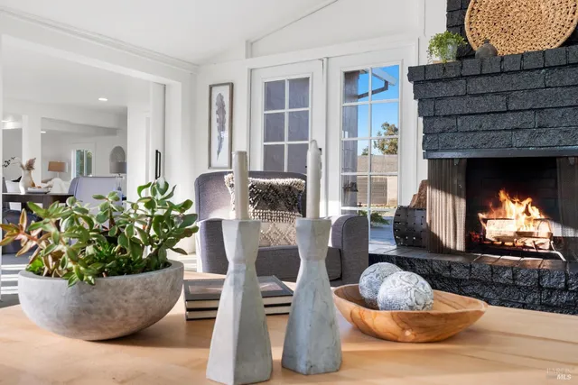 an aerial view of a house with garden space and street view