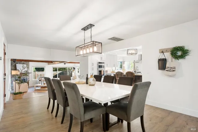 a view of a dining room with furniture