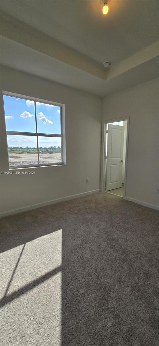2729 Southeast 26th Road, Unit 2729 Homestead, FL 33035 - Photo 25 of 57 an empty room with windows