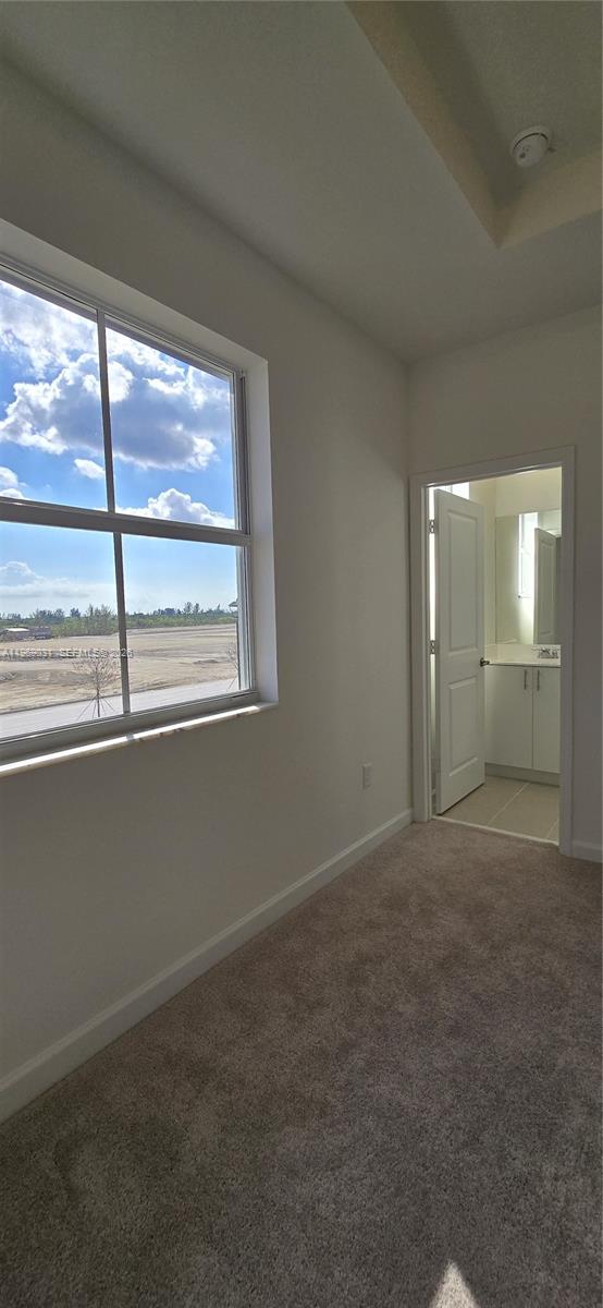 2729 Southeast 26th Road, Unit 2729 Homestead, FL 33035 - Photo 26 of 57 a view of an empty room with a window