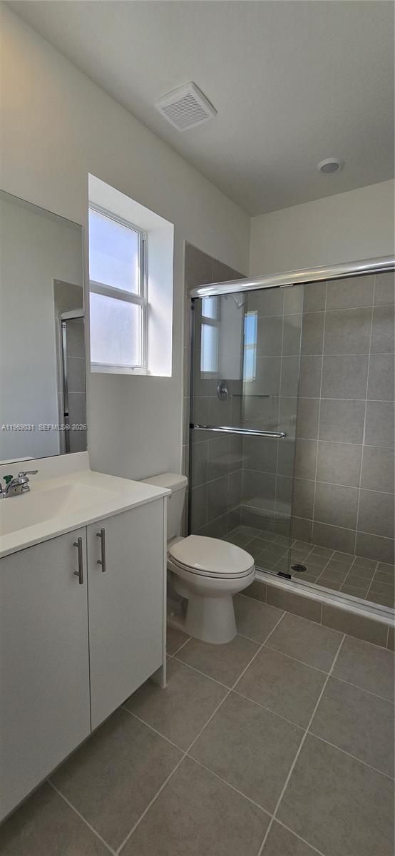 2729 Southeast 26th Road, Unit 2729 Homestead, FL 33035 - Photo 27 of 57 a bathroom with a sink a toilet and shower