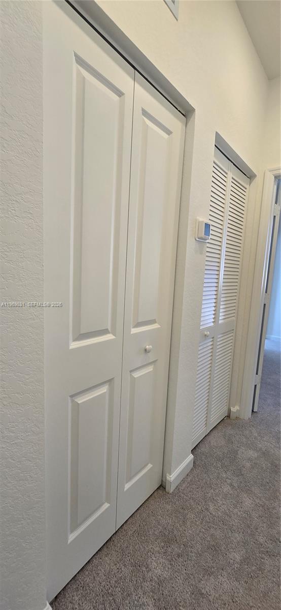 2729 Southeast 26th Road, Unit 2729 Homestead, FL 33035 - Photo 33 of 57 an empty room with wooden door