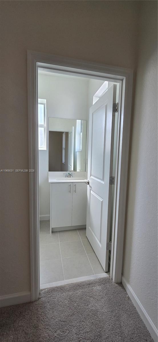 2729 Southeast 26th Road, Unit 2729 Homestead, FL 33035 - Photo 38 of 57 a view of a bathroom with a bathtub and a sink