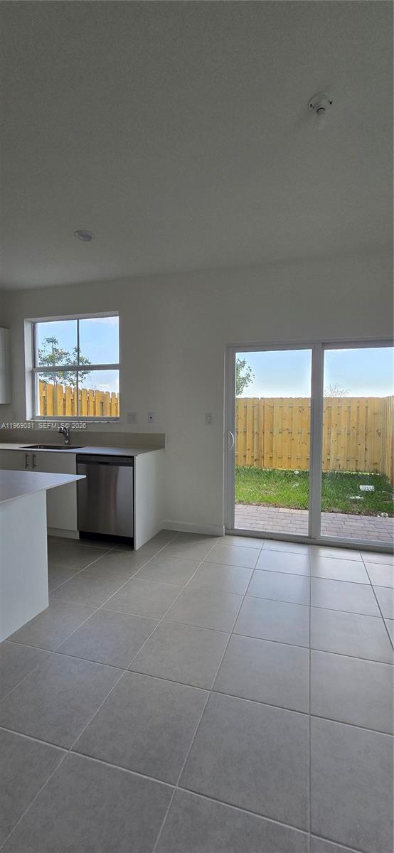 2729 Southeast 26th Road, Unit 2729 Homestead, FL 33035 - Photo 40 of 57 a view of an empty room with a window