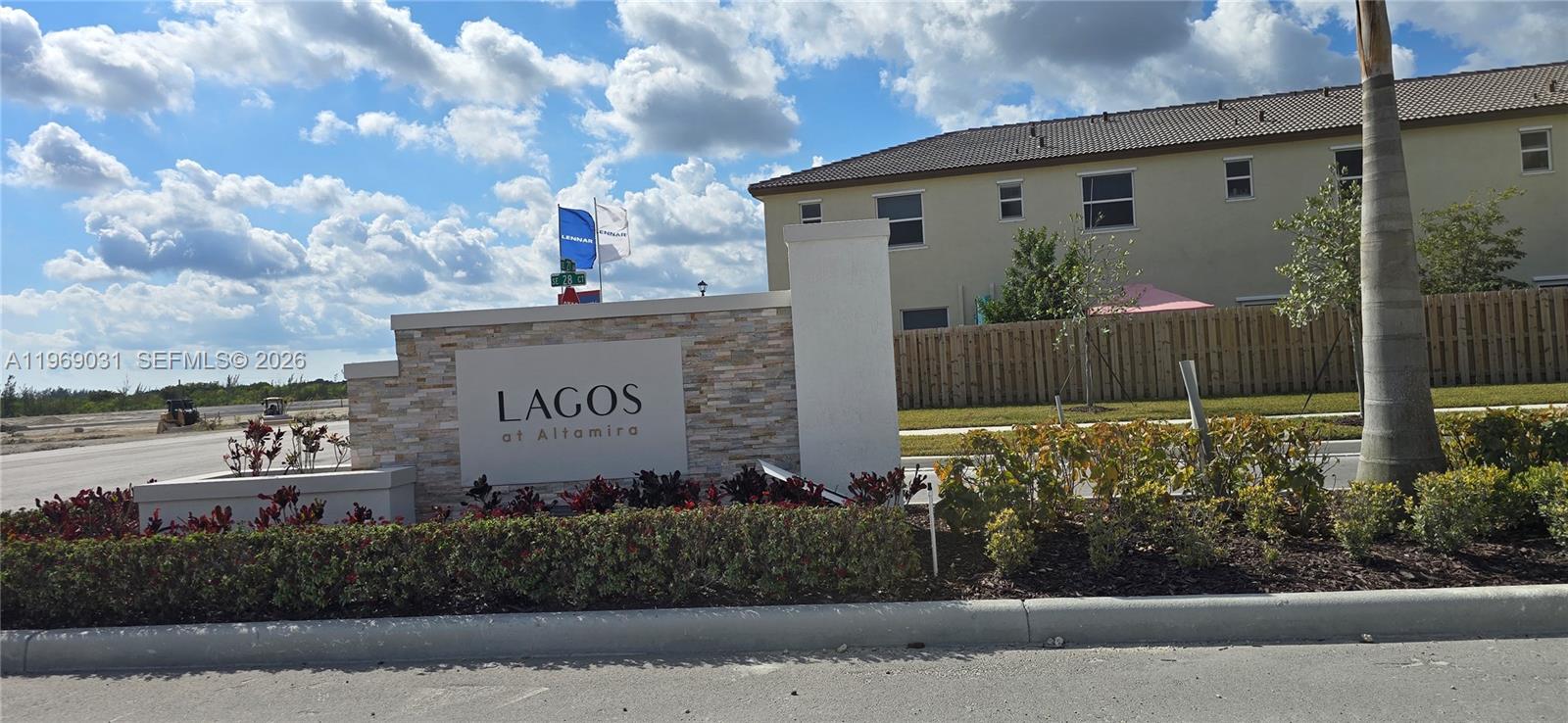 2729 Southeast 26th Road, Unit 2729 Homestead, FL 33035 - Photo 5 of 57 a sign on the side of a building