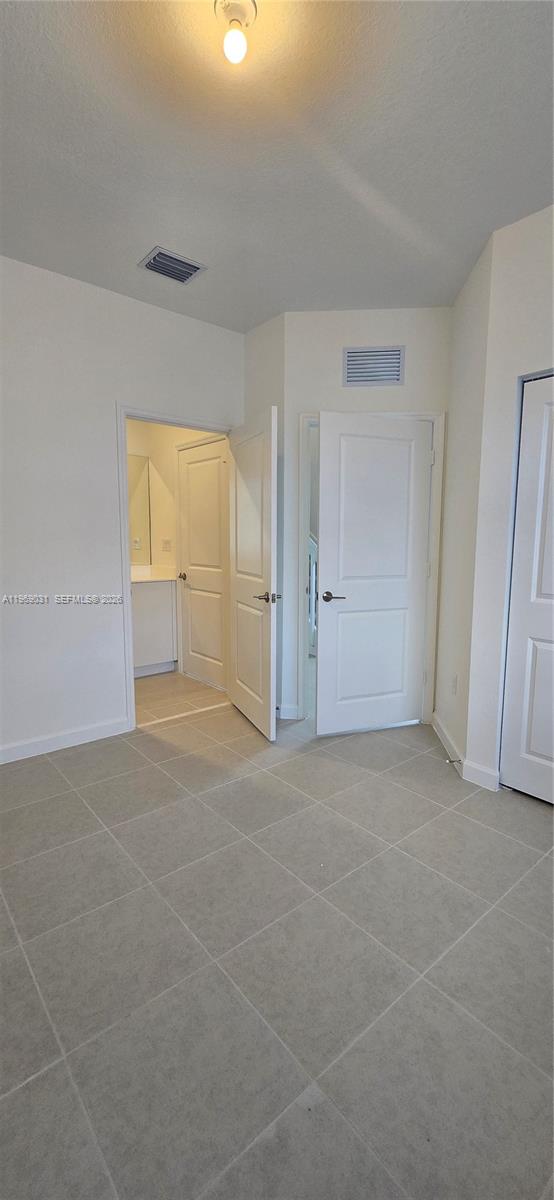 2729 Southeast 26th Road, Unit 2729 Homestead, FL 33035 - Photo 9 of 57 a view of an empty room
