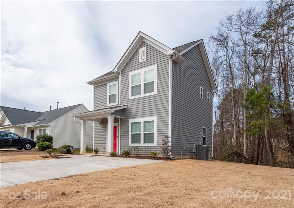 5027 Elizabeth Road Charlotte, NC 28269 - Photo 23 of 23 a front view of a house with a yard