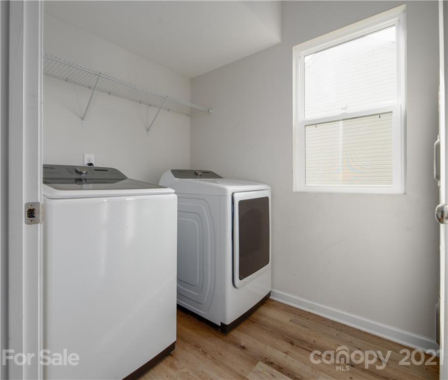 5027 Elizabeth Road Charlotte, NC 28269 - Photo 8 of 23 a utility room with dryer and washer
