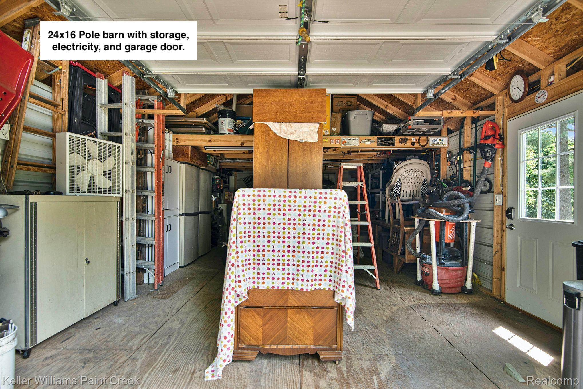 3354 East Cook Road Grand Blanc, MI 48439 - Photo 27 of 35 Plenty of storage between floor space and loft.