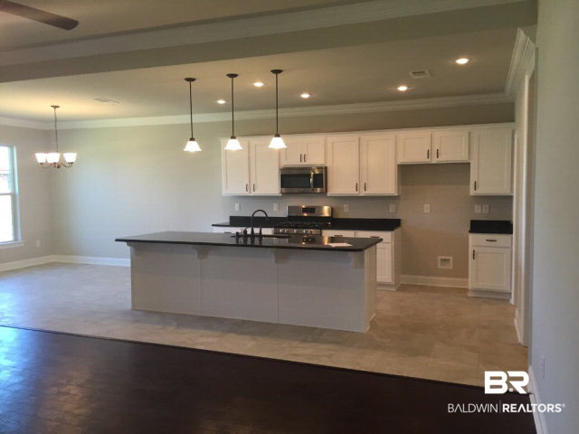 7106 Rocky Rd Loop Gulf Shores, AL 36542 - Photo 9 of 17 Kitchen w/ Island