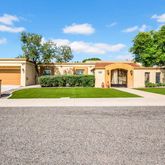 a house with yard in front of it