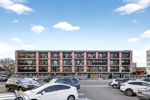 a front view of multi story residential apartment building