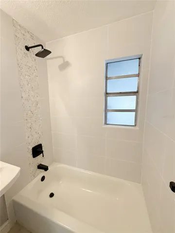 a bathroom with a bathtub
