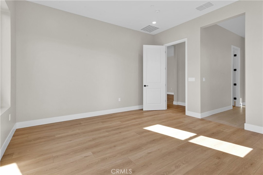 3731 Siembra Road Paso Robles, CA 93446 - Photo 12 of 21 a view of an empty room with wooden floor
