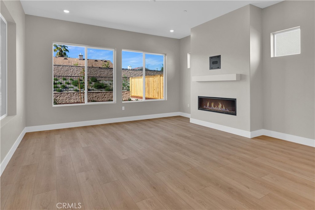 3731 Siembra Road Paso Robles, CA 93446 - Photo 4 of 21 a view of an empty room with a window and fireplace